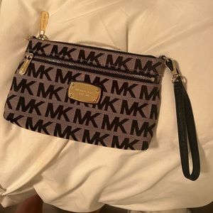 Black monogrammed Michael Kors wristlet